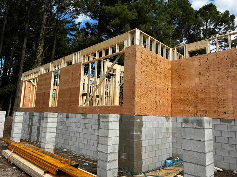 New home framing being constructed by Stimis Enterprises LLC